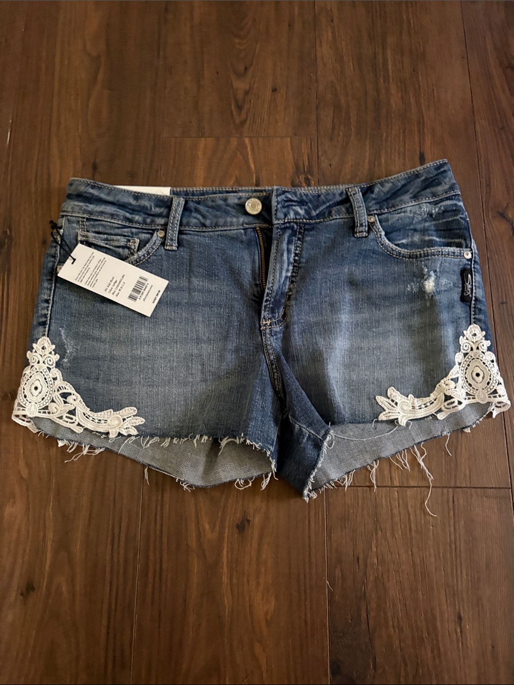 Silver Jeans Blue Denim Cutoff Shorts with White Crochet Trim